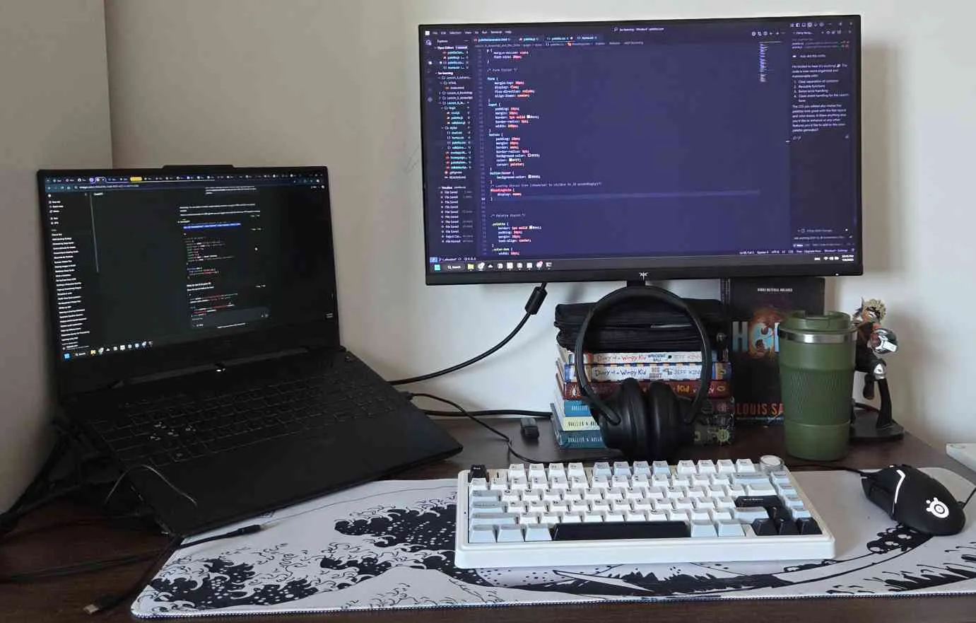 Participant setup with laptop, monitor, and mechanical keyboard at Grizzly Hacks Fall 2025
